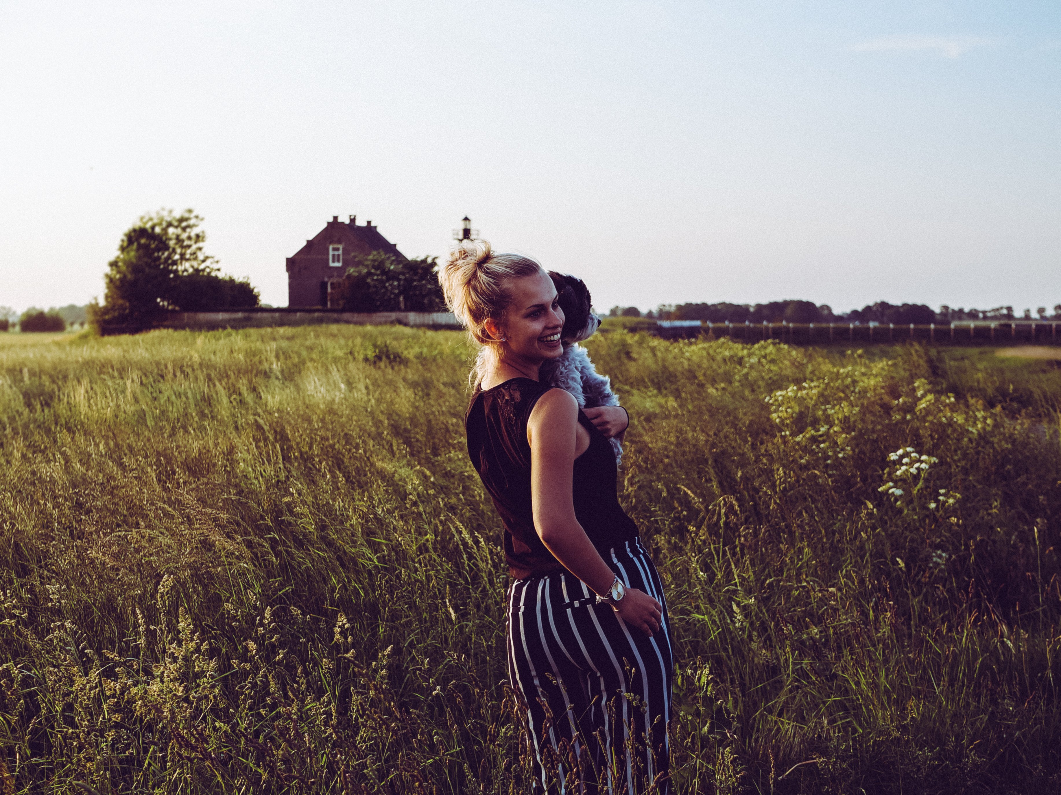 Canva - Mother and Child Walking on the Grass Field